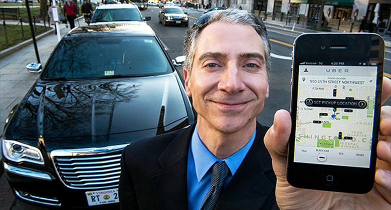 Uber driver shows his app for hiring black car